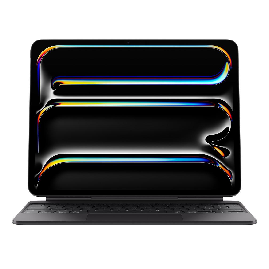 Side exterior, iPad Pro attached to Magic Keyboard in landscape orientation, Black, side is tilted back, charging port near the folding area, floating cantilever design